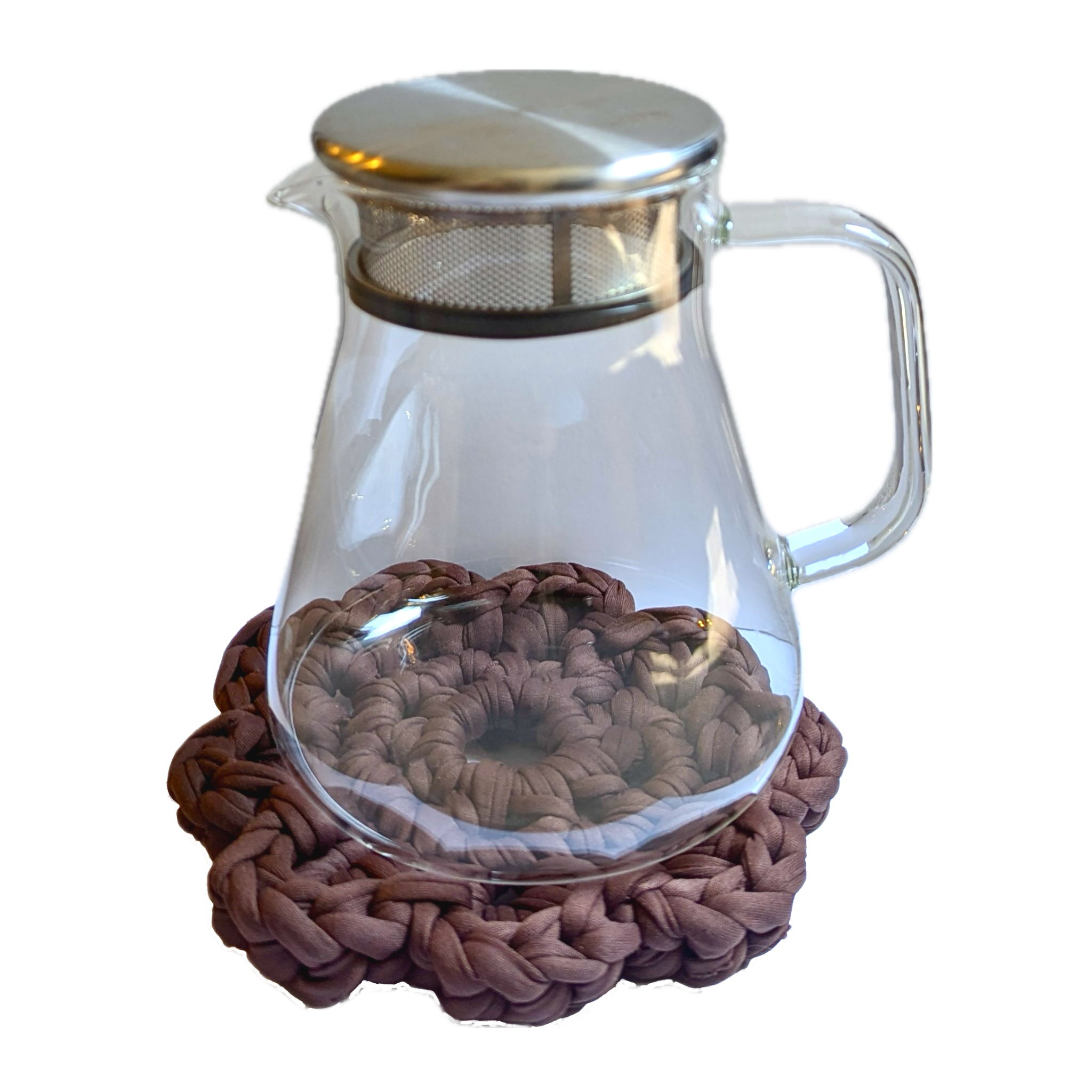 teapot on brown flower coaster
